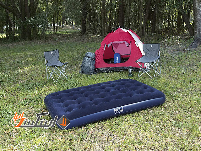 تشک بادی در کنار چادر مسافرتی